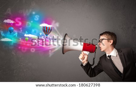 Handsome man shouting into megaphone and abstract text and balloons come out