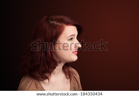 Young girl portrait thinking with plain copyspace