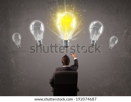 Business person having an bright idea light bulb concept