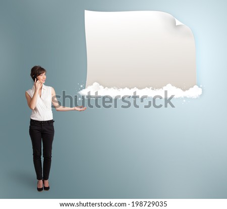 pretty young woman making phone call and presenting modern copy space on clouds