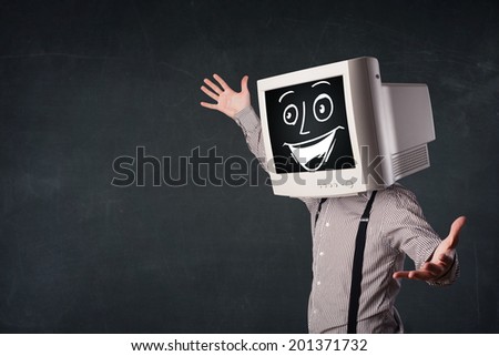 Happy businessman with a personal computer monitor head and a smiley face
