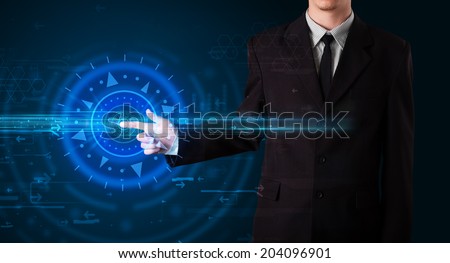 Tech guy pressing high technology control panel screen concept