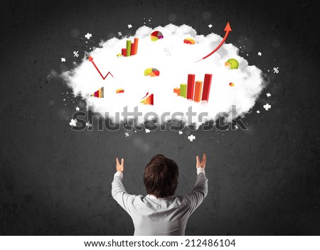 Young businessman standing with colorful charts in a cloud above his head