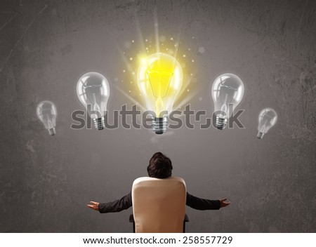 Business person having an bright idea light bulb concept
