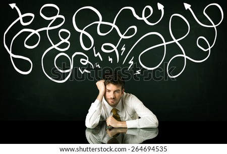 Depressed businessman sitting under white drawn direction lines