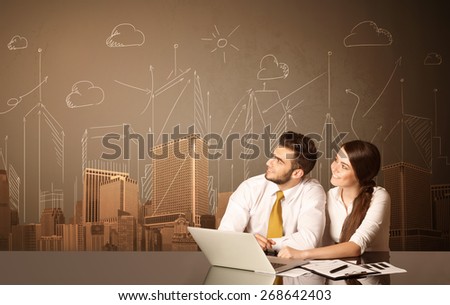 Business couple sitting at the black table with buildings and measurements on the background