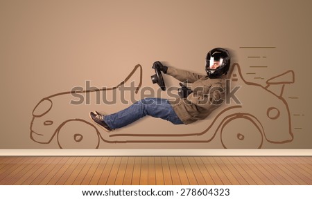 Happy man driving an hand drawn car on the wall concept