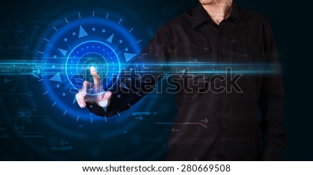 Tech guy pressing high technology control panel screen concept