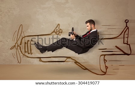 Funny pilot driving a hand drawn airplane on the wall concept