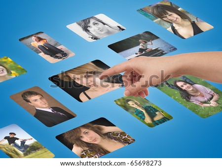 Man hand choosing portraits from my gallery