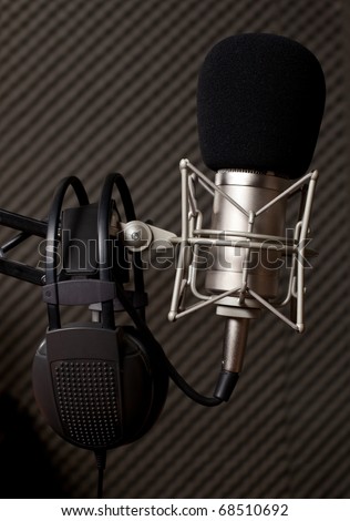 Radio studio, microphone and big headphone
