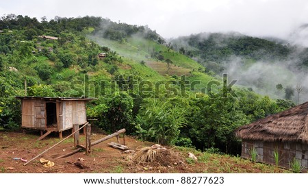 Traditional jungle bamboo huts village, Chiang May, Thailand