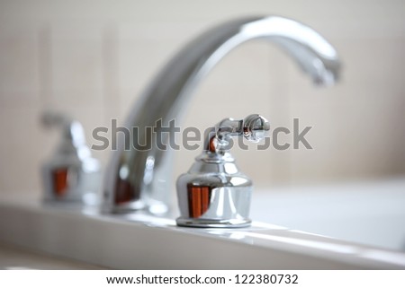 Close up shot of nice tub faucet