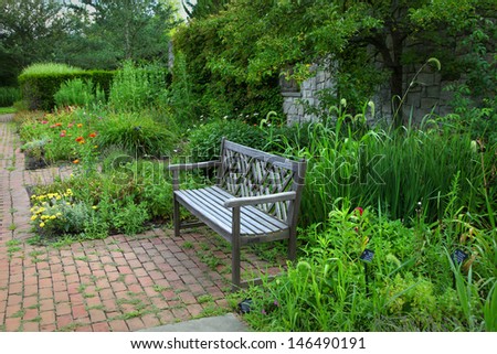 Bench in flower garden