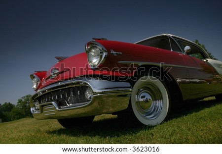 stock photo Old time American muscle car wide angle shot