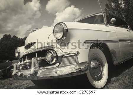 stock photo Vintage car at car show in sepia color tone