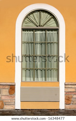 Energy efficient arched window on a florida house
