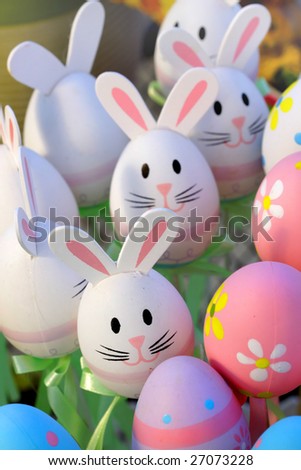 Many colorful designed easter eggs and bunny toys
