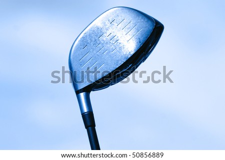 Golf club against sky background in blue color tone