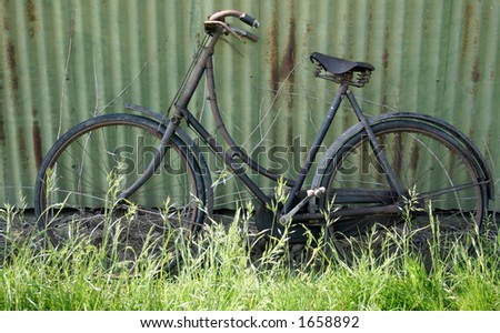 Old bike looks a bit of an old bone shaker, but with alot of time and attention could be restored into new condition