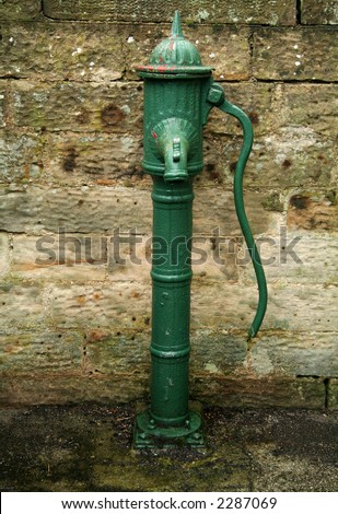 The handle on the water pump was pushed up and down to bring the water from underground
