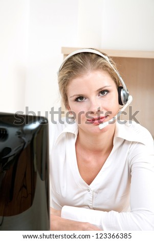 young customer service representative online with a computer