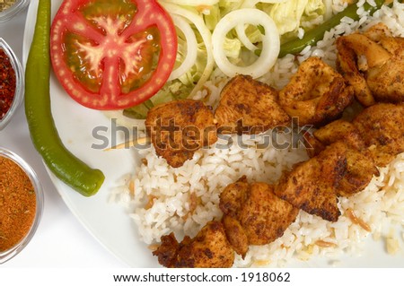 Chicken fillet ready to serve with rice and salads