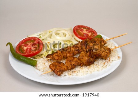 Chicken fillet ready to serve with rice and salads