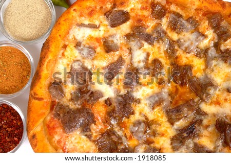 pizza with meat and cheese