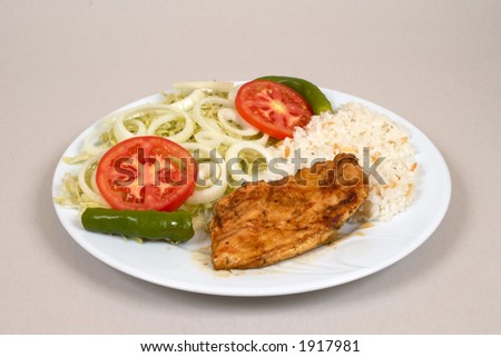 chicken fillet with rice and salads