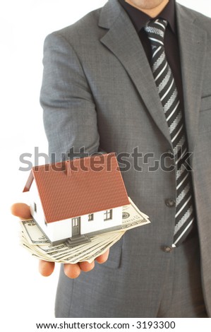 businessman with house and US dollars on white background