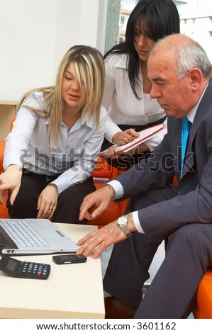 business team working with laptop at the office