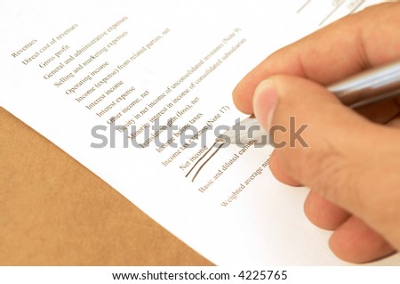 businessman working on income statement