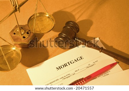 real estate concept with a mortgage application form with gavel