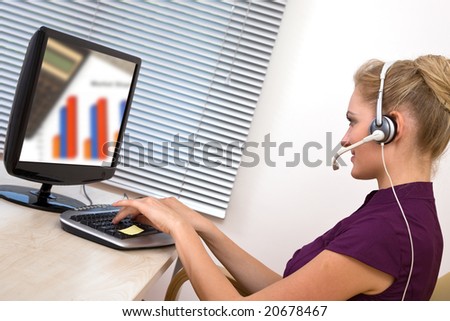 customer service representative at the office with computer