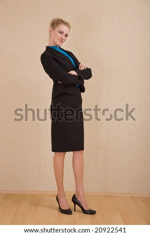 young businesswoman portrait on wallpaper background