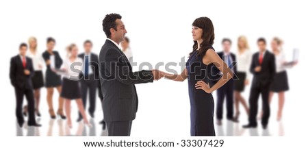 business teamwork concept with a handshake and big team
