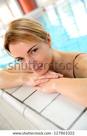 Blond woman relaxing in spa pool