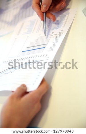 Closeup on business papers set on table