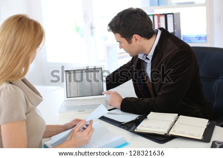 Woman meeting lawyer to set up her own business