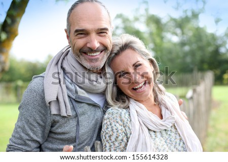 Cheerful Senior Couple Enjoying Peaceful Nature