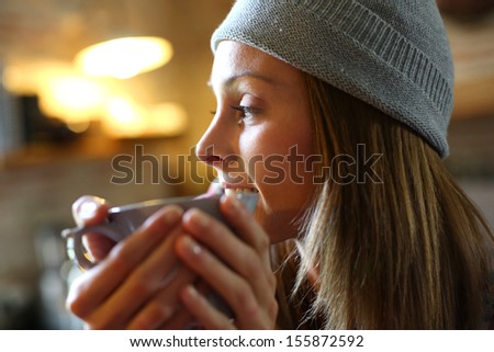 Trendy Girl At Home Having Hot Drink