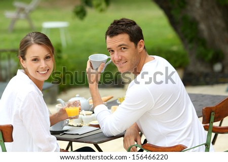 Romantic breakfast in hotel garden