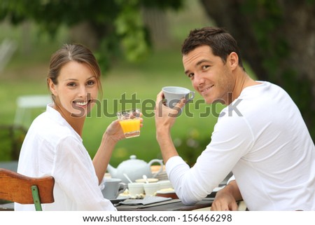 Romantic breakfast in hotel garden