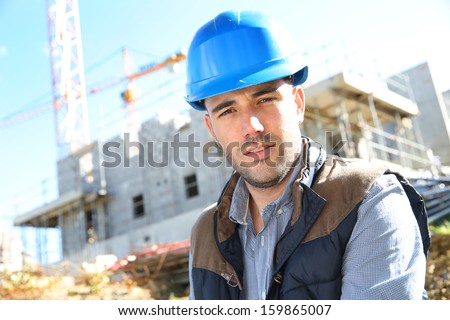 Portrait of construction manager with security helmet