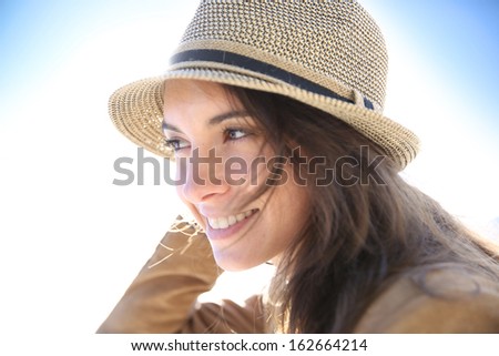 Portrait of attractive woman wearing hat