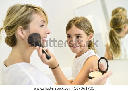 Little Girl Playing With Her Mom\'S Makeup