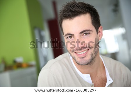 Portrait of smiling attractive man