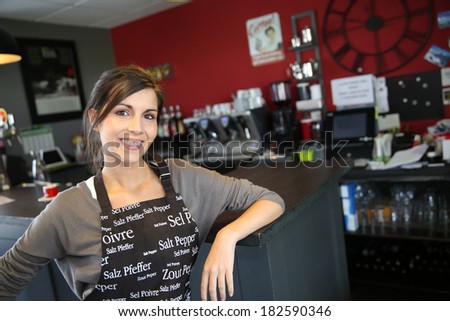 Portrait of beautiful waitress in coffee shop
