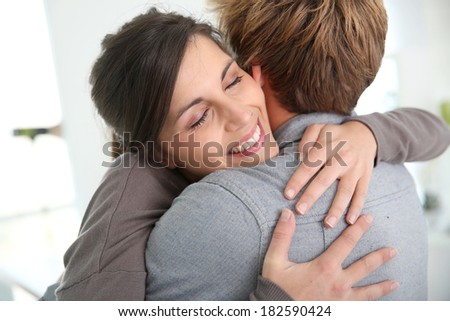 Couple embracing, happy to get back together